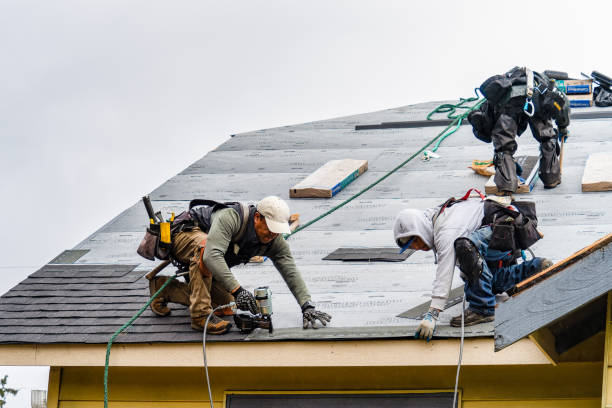Professional Gutter Installation technician working in Sterling, MA